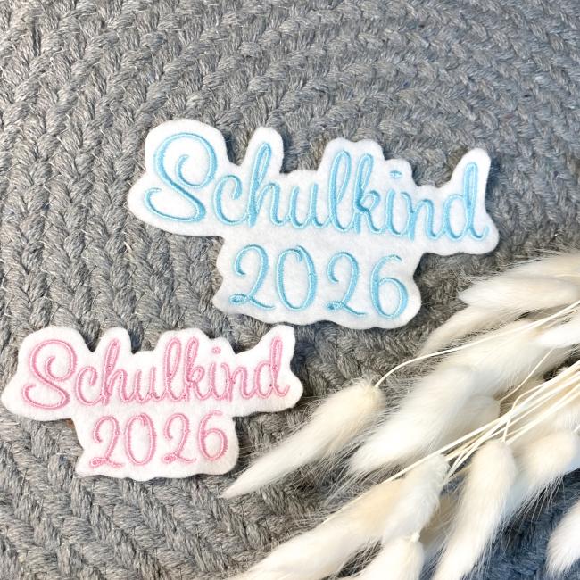 Applikation Schulkind  2026 auf weißem Filz