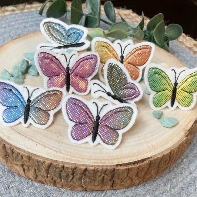 Applikation gestickte Schmetterlinge / Glitzer Regenbogenfarben zum aufbügeln / Aufnäher  für DIY , Taschen, Schultüten, Kissen u.v.m.