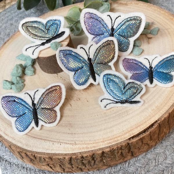 Applikation gestickte Schmetterlinge / Glitzer Regenbogenfarben zum aufbügeln / Aufnäher  für DIY , Taschen, Schultüten, Kissen u.v.m.